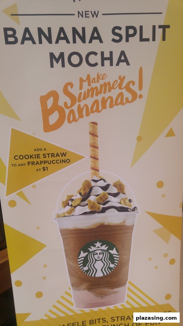 A Starbucks promotional poster featuring the new Banana Split Mocha Frappuccino and a cookie straw.