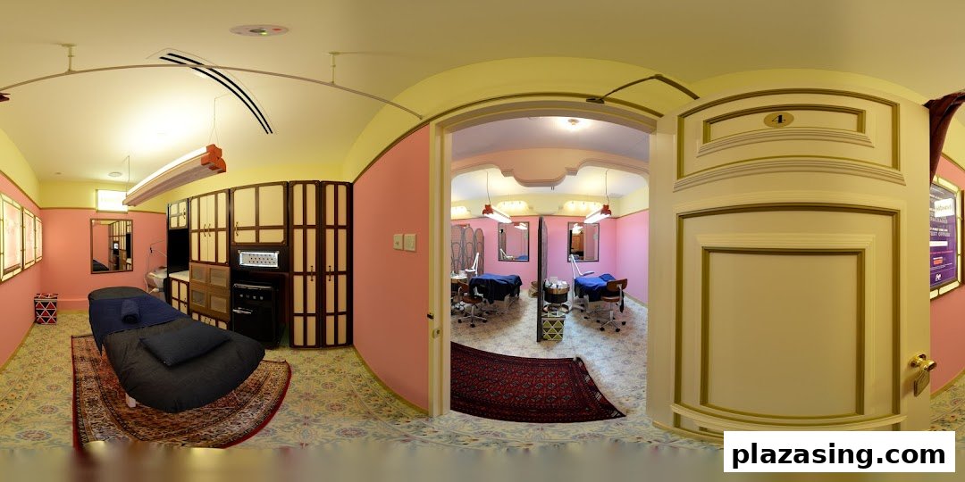 Interior view of a modern beauty salon with multiple treatment rooms and equipment.