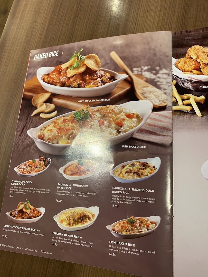 A close-up of Swensen's menu page showcasing various baked rice dishes with descriptions and prices.