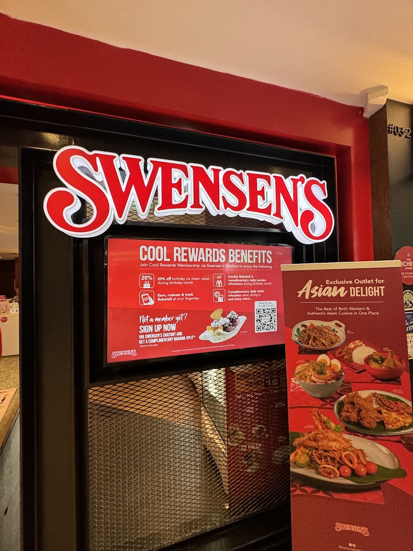 Swensen's shop front featuring its prominent red logo, membership benefits, and an 'Asian Delight' banner.