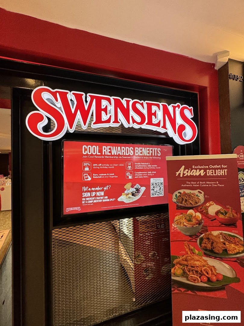Swensen's shop front featuring its prominent red logo, membership benefits, and an 'Asian Delight' banner.