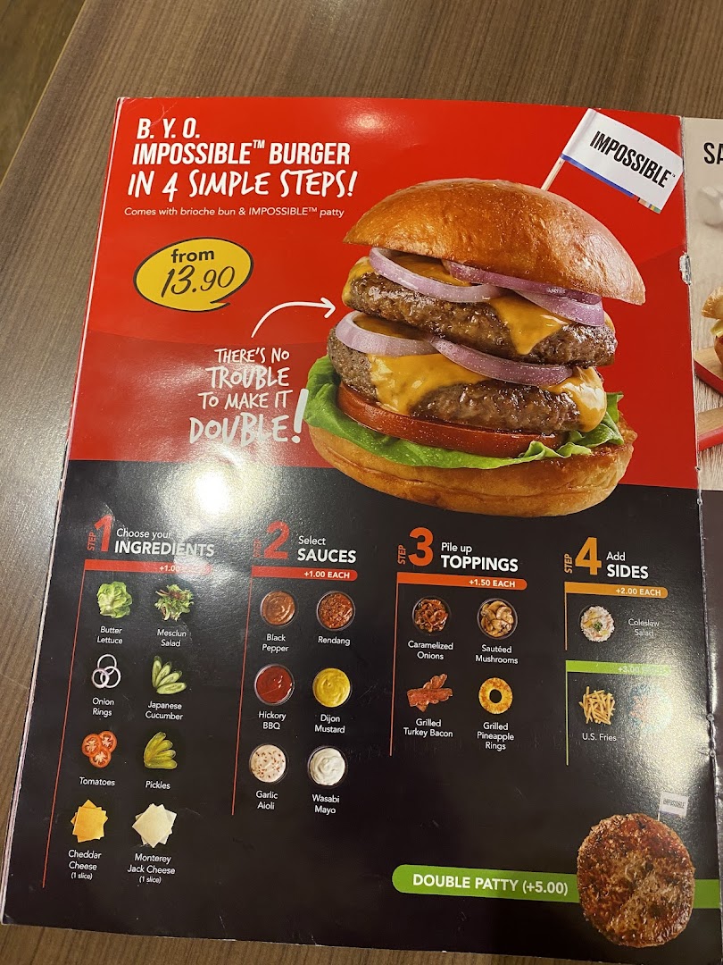 A menu page showcasing Swensen's customizable B.Y.O. Impossible Burger with various ingredients, sauces, toppings, and sides.
