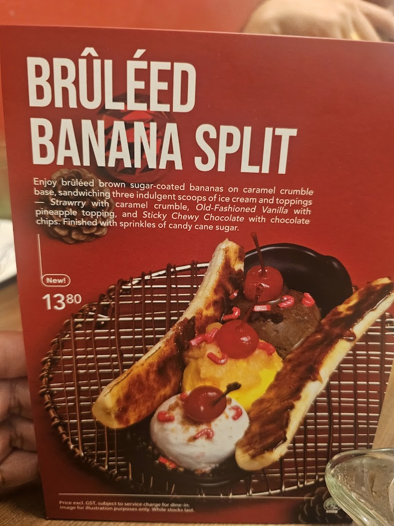 A menu page showcasing Swensen's new Brûléed Banana Split dessert with its description and price.