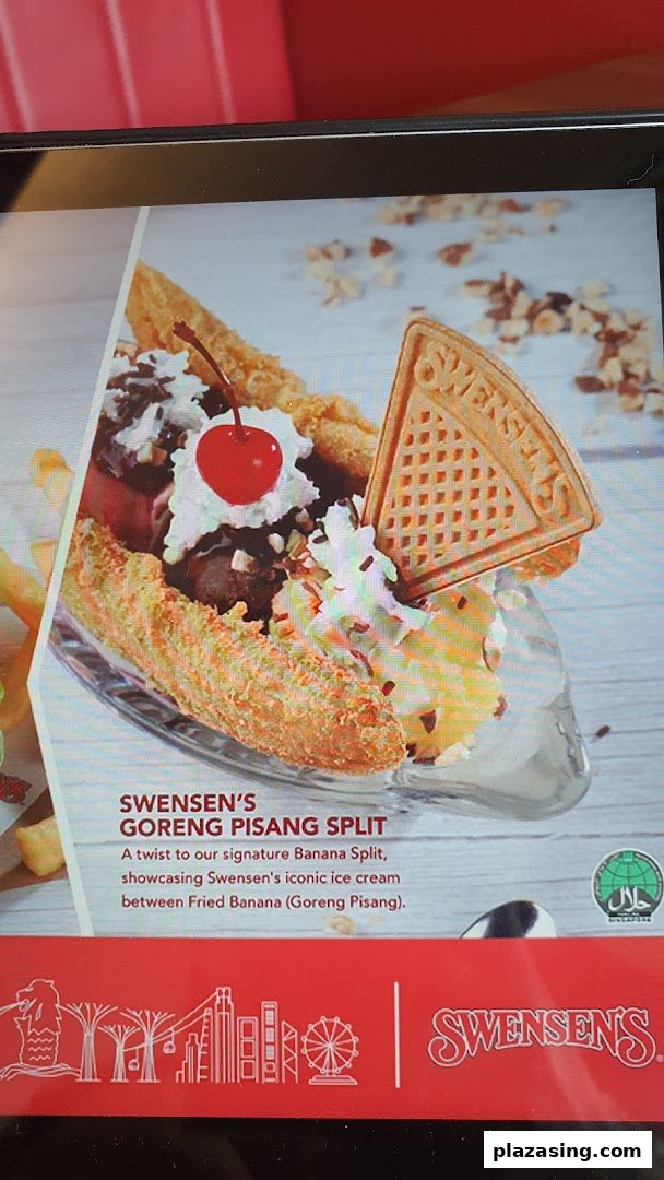 A vibrant image showcasing Swensen's Goreng Pisang Split dessert with ice cream and fried banana.