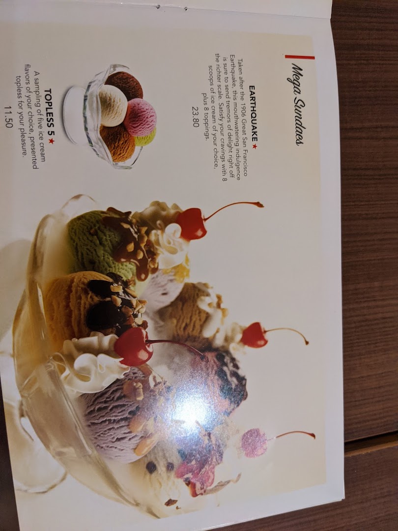 A vibrant menu page from Swensen's showcasing delicious Mega Sundaes and ice cream selections.