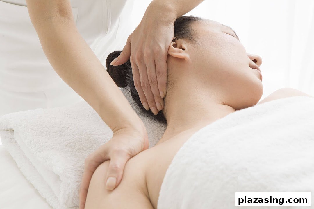 A person receiving a relaxing neck and shoulder massage at a spa.