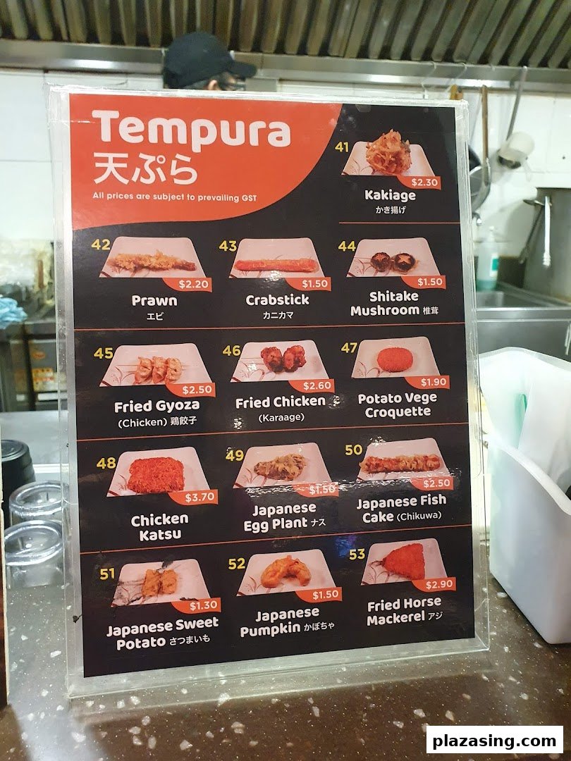 A close-up image of a menu board displaying various tempura items with their prices and numbers.