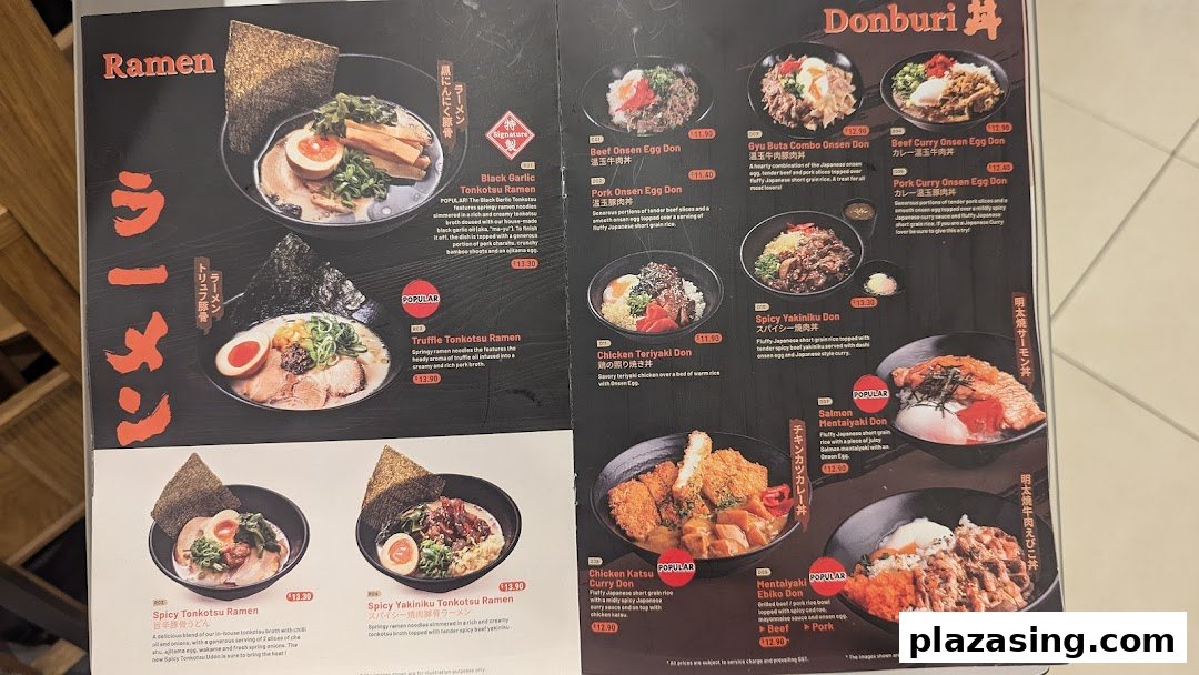 A detailed menu board showcasing various ramen and donburi dishes with images and descriptions.