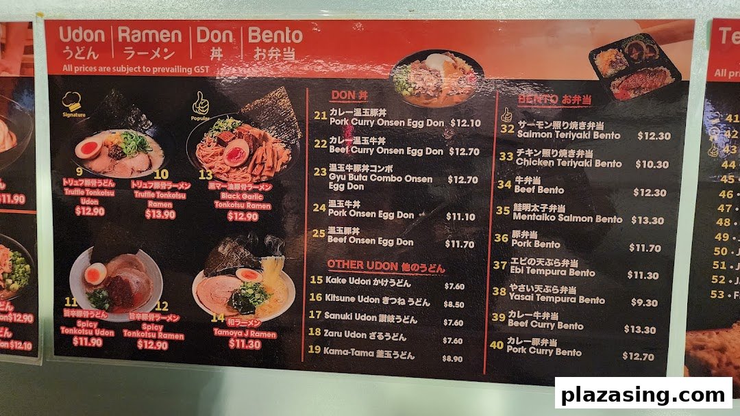 A detailed menu board displaying various Japanese Udon, Ramen, Donburi, and Bento sets with prices.