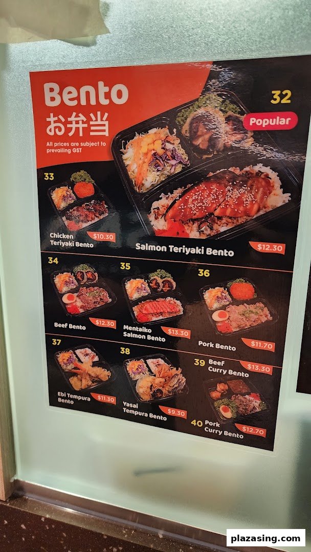 A vibrant menu board displaying various Japanese bento sets with prices and images.