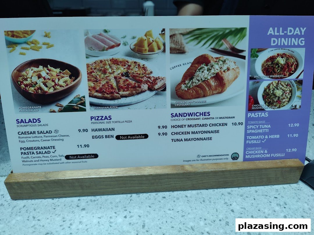 A detailed menu display from The Coffee Bean & Tea Leaf, showcasing salads, pizzas, sandwiches, and pastas.