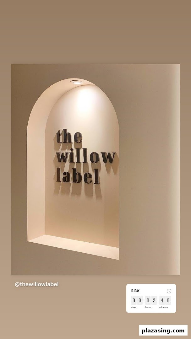 The Willow Label brand name displayed in a stylish, illuminated archway.