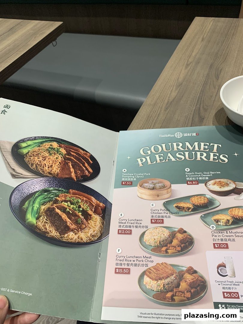 A close-up view of Tim Ho Wan's menu, showcasing various dim sum, rice dishes, and desserts.
