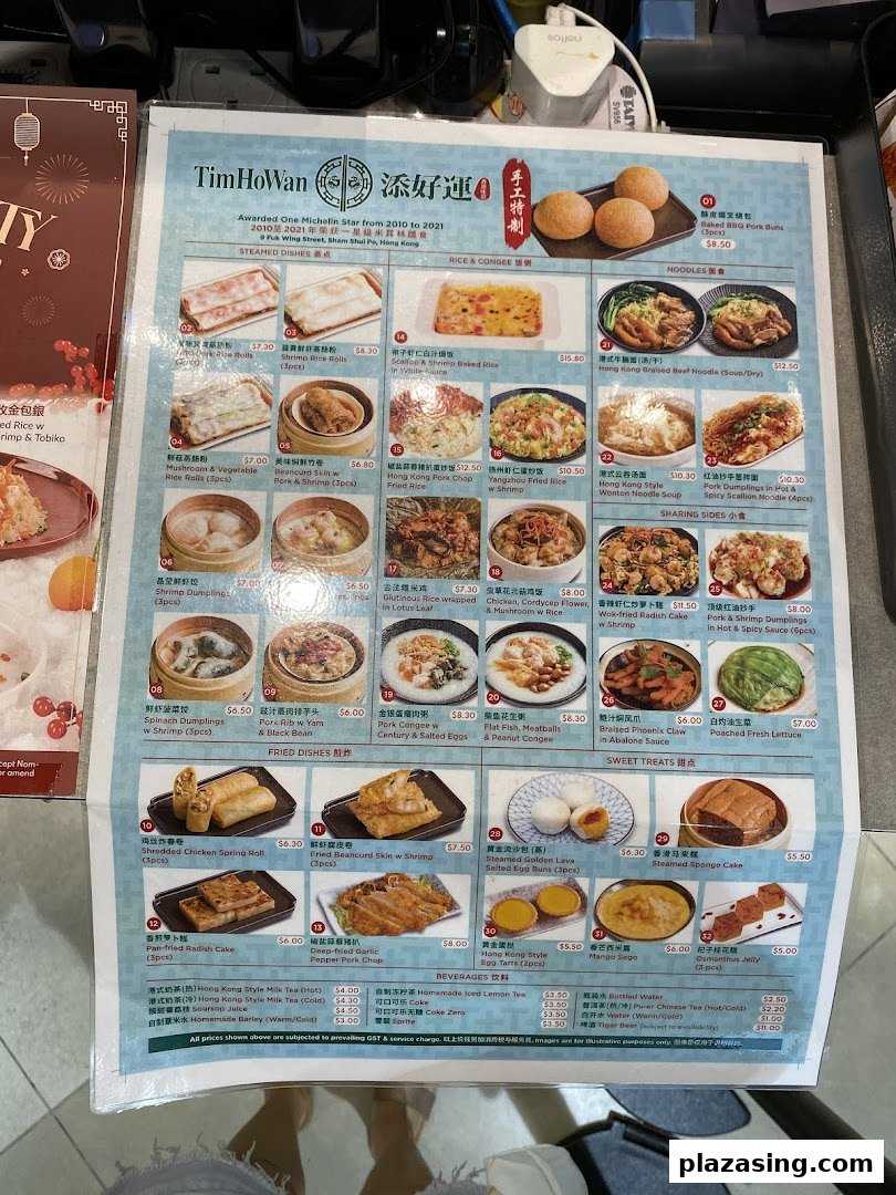 A detailed menu from Tim Ho Wan, featuring various dim sum, rice, noodles, and beverages.