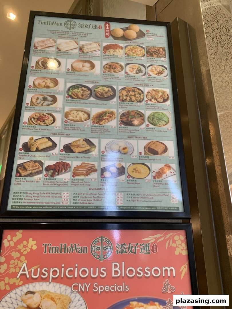 A detailed menu board for Tim Ho Wan, showcasing a variety of dim sum, noodles, rice, and beverages.