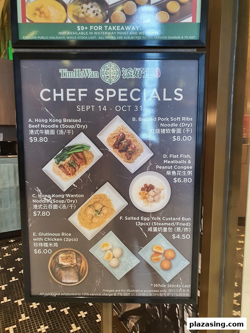 A display board showcasing Tim Ho Wan's Chef Specials menu with various Hong Kong dishes and prices.