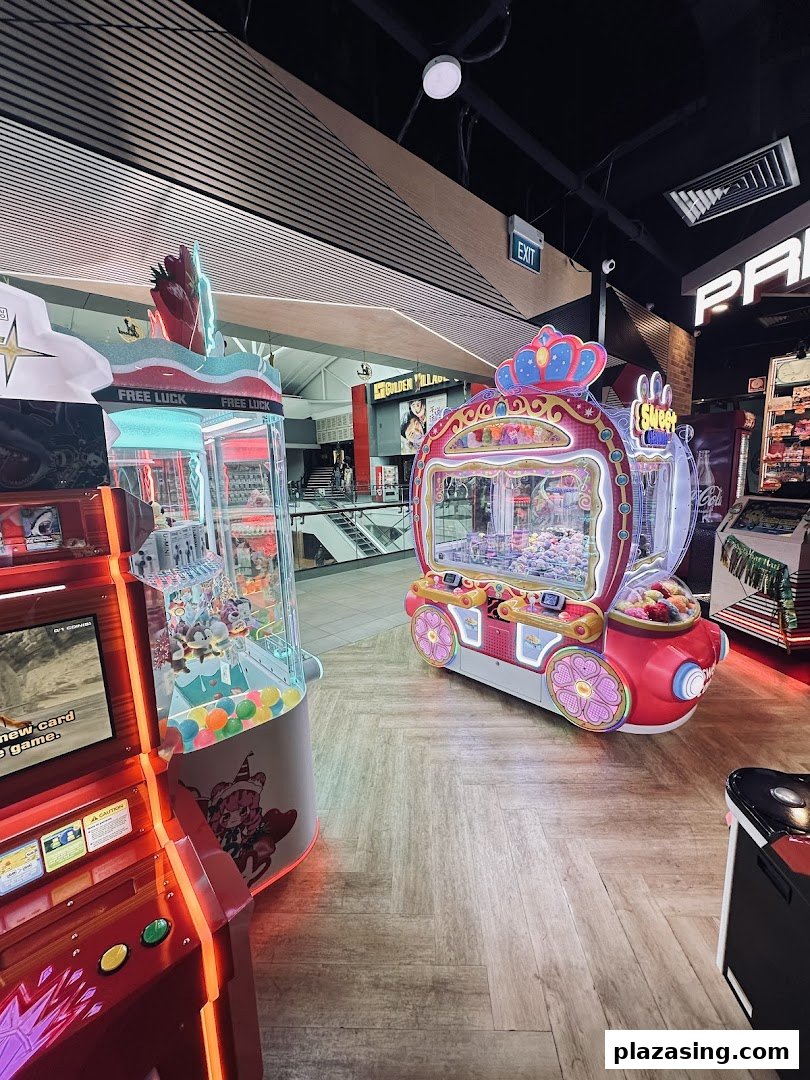 An interior view of Timezone arcade featuring colorful claw machines and other game machines.