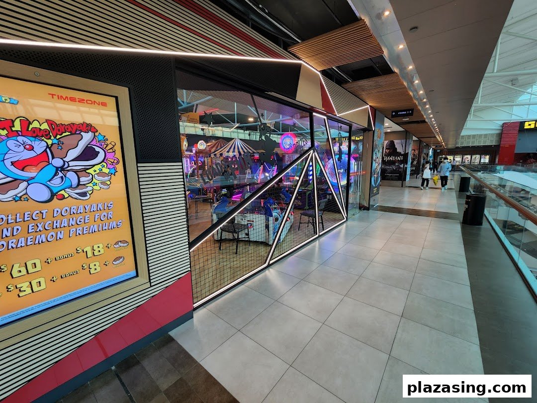 The vibrant entrance of Timezone arcade, featuring a large promotional display for Doraemon premiums.