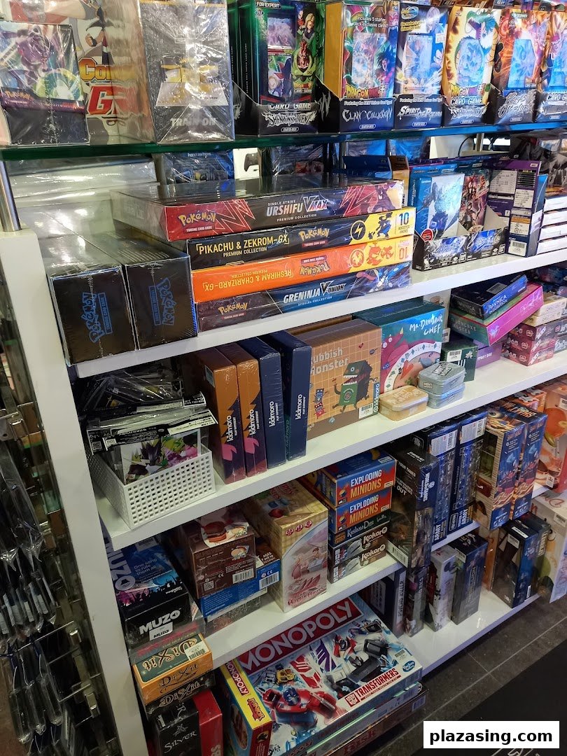 Shelves filled with a wide variety of board games, card games, and collectible items.