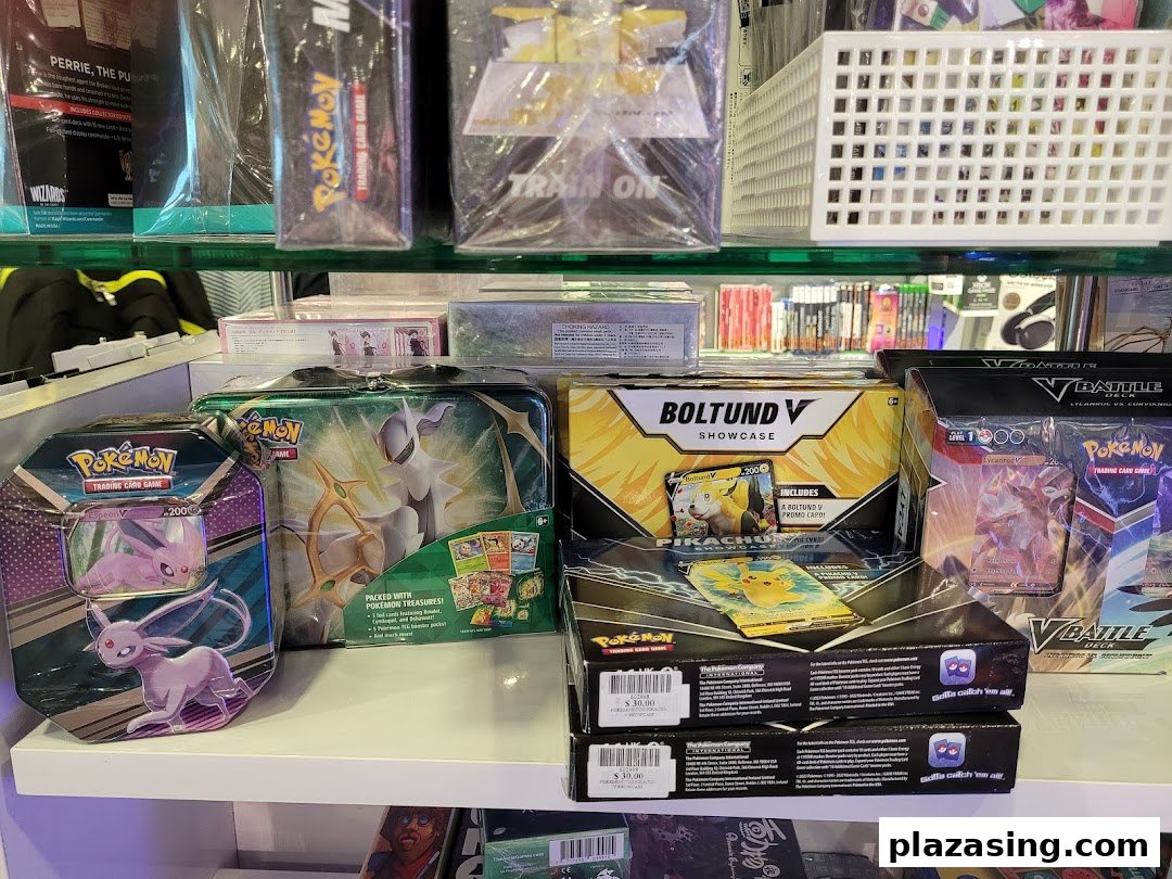 A shelf displaying various Pokémon Trading Card Game products, including tins, boxes, and booster packs.
