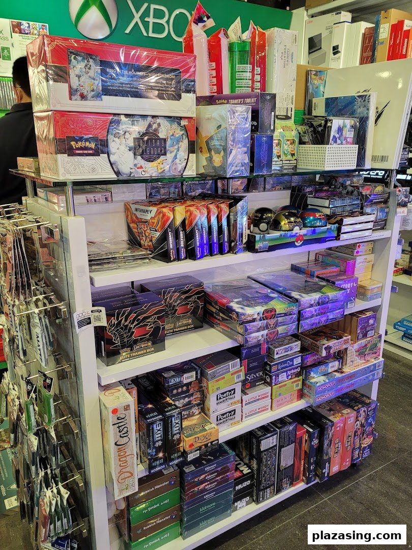 A vibrant retail display shelf showcasing a wide array of board games, card games, and collectibles.