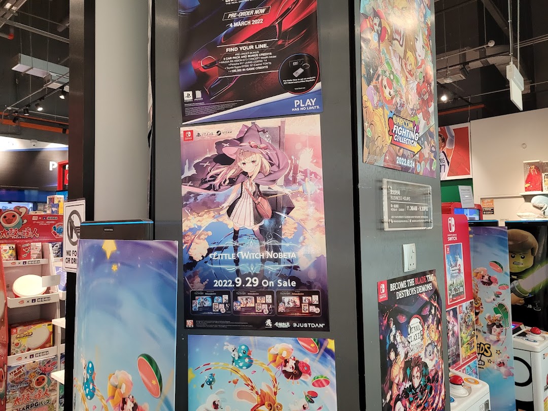 An interior view of TOG, showcasing vibrant game posters and product displays.