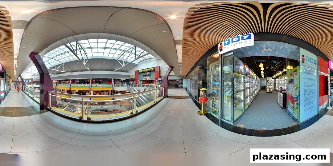 The entrance of Toy Outpost in Plaza Singapura, showcasing display cases filled with collectibles and toys.
