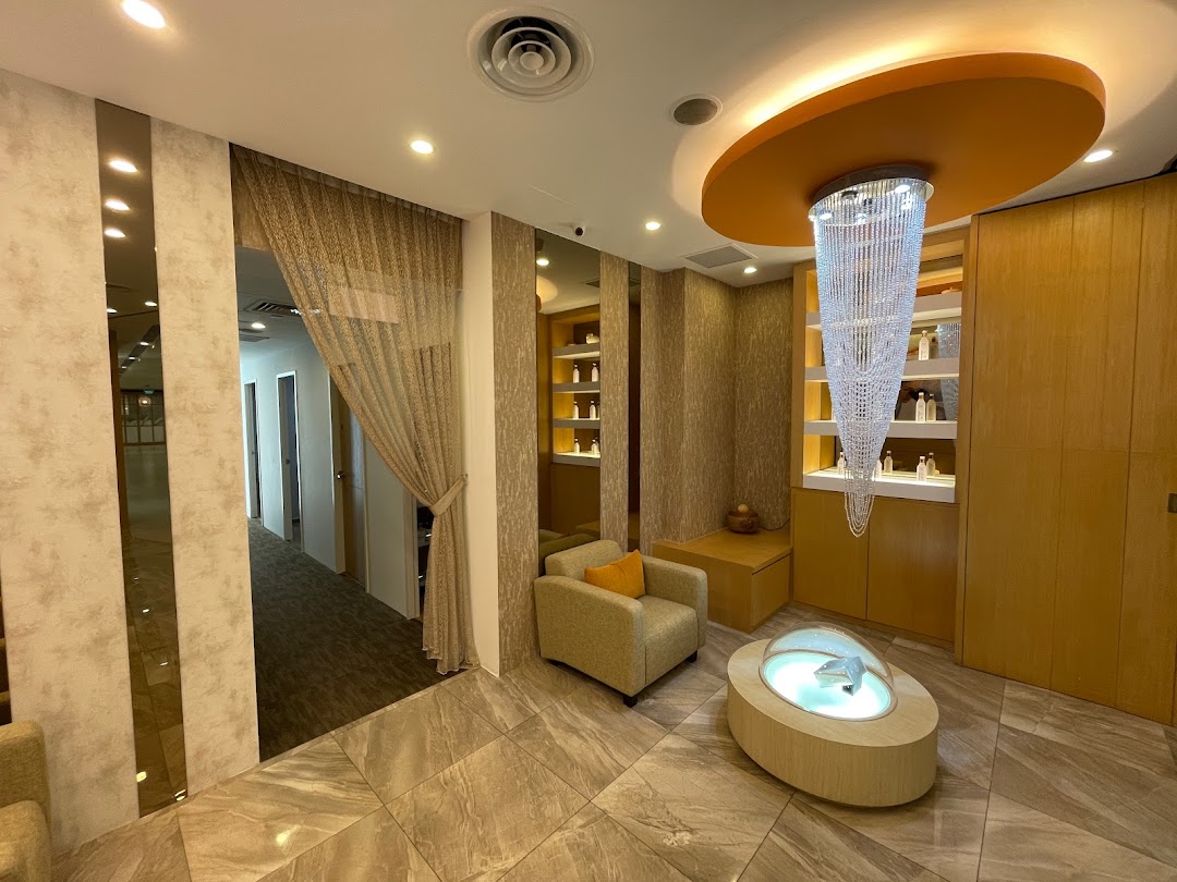 An elegant interior of True Harmony, featuring a luxurious chandelier, comfortable seating, and a serene ambiance.