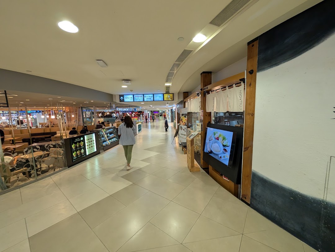 The entrance of Tsukada Nojo, featuring a digital display showcasing their collagen hotpot dishes.