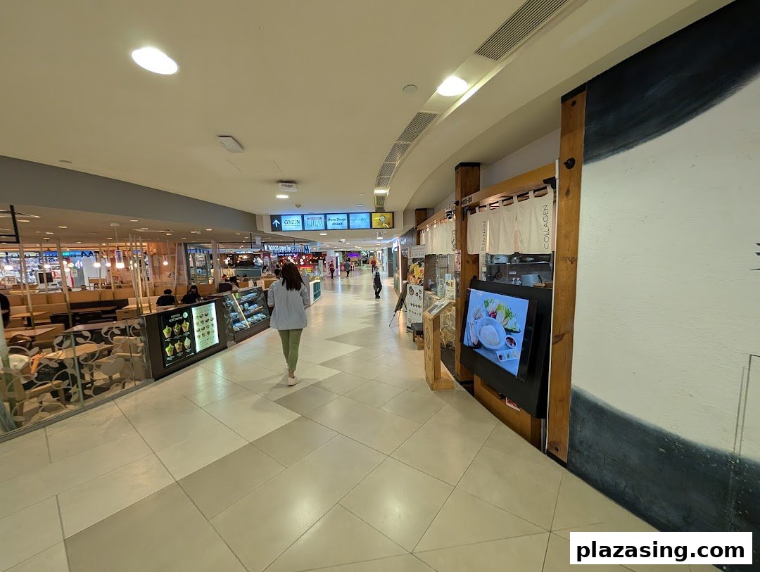 The entrance of Tsukada Nojo, featuring a digital display showcasing their collagen hotpot dishes.