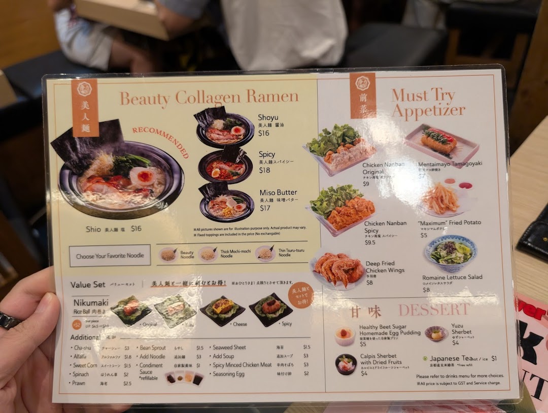 A detailed menu showcasing collagen ramen, appetizers, desserts, and additional toppings.
