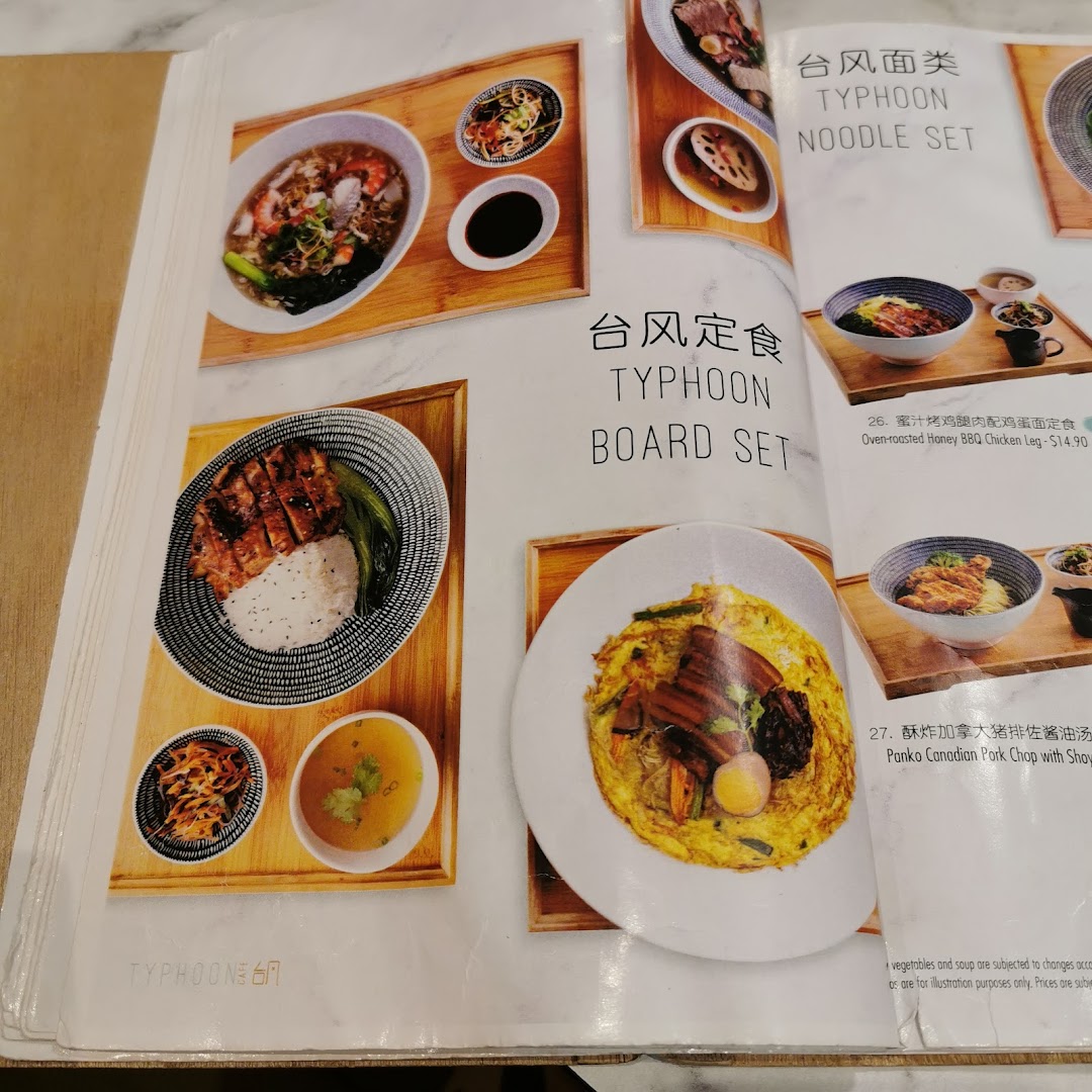 A menu page showcasing Typhoon Cafe's noodle and board sets with delicious food photography.