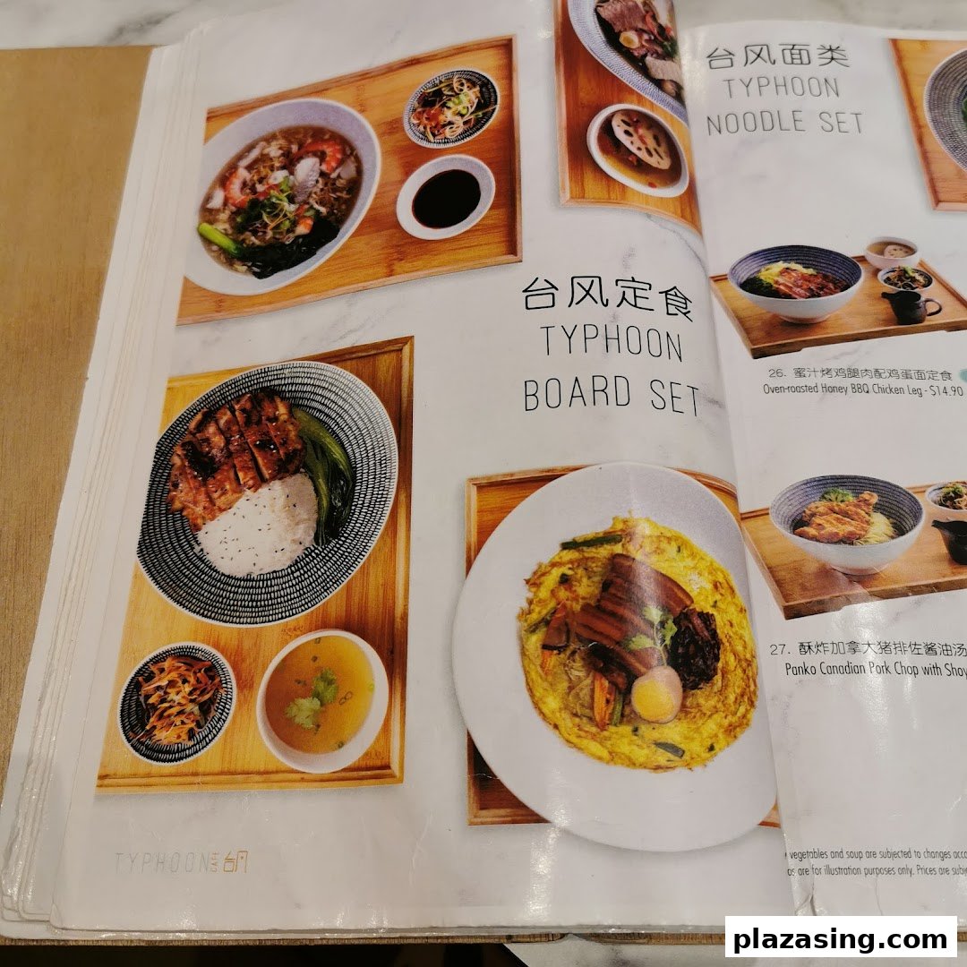 A menu page showcasing Typhoon Cafe's noodle and board sets with delicious food photography.