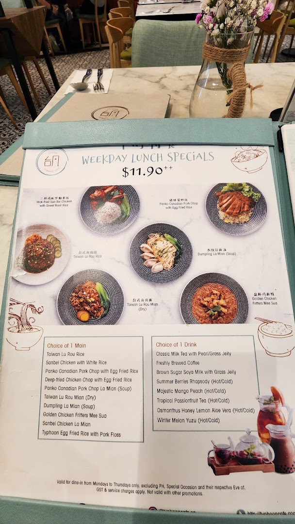 A detailed menu displaying weekday lunch specials with various main courses and drink options.