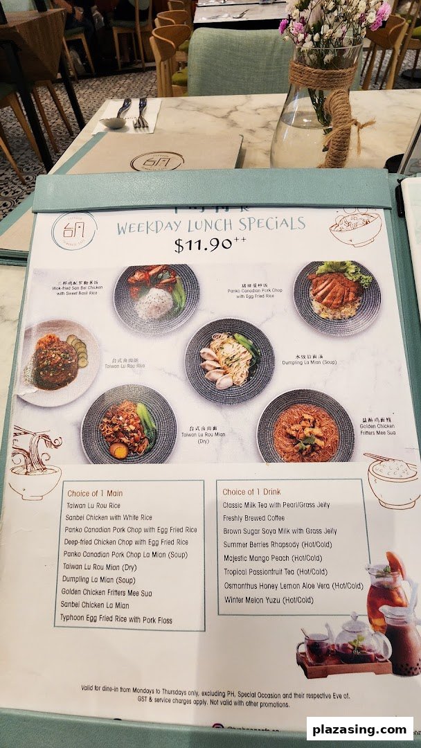 A detailed menu displaying weekday lunch specials with various main courses and drink options.