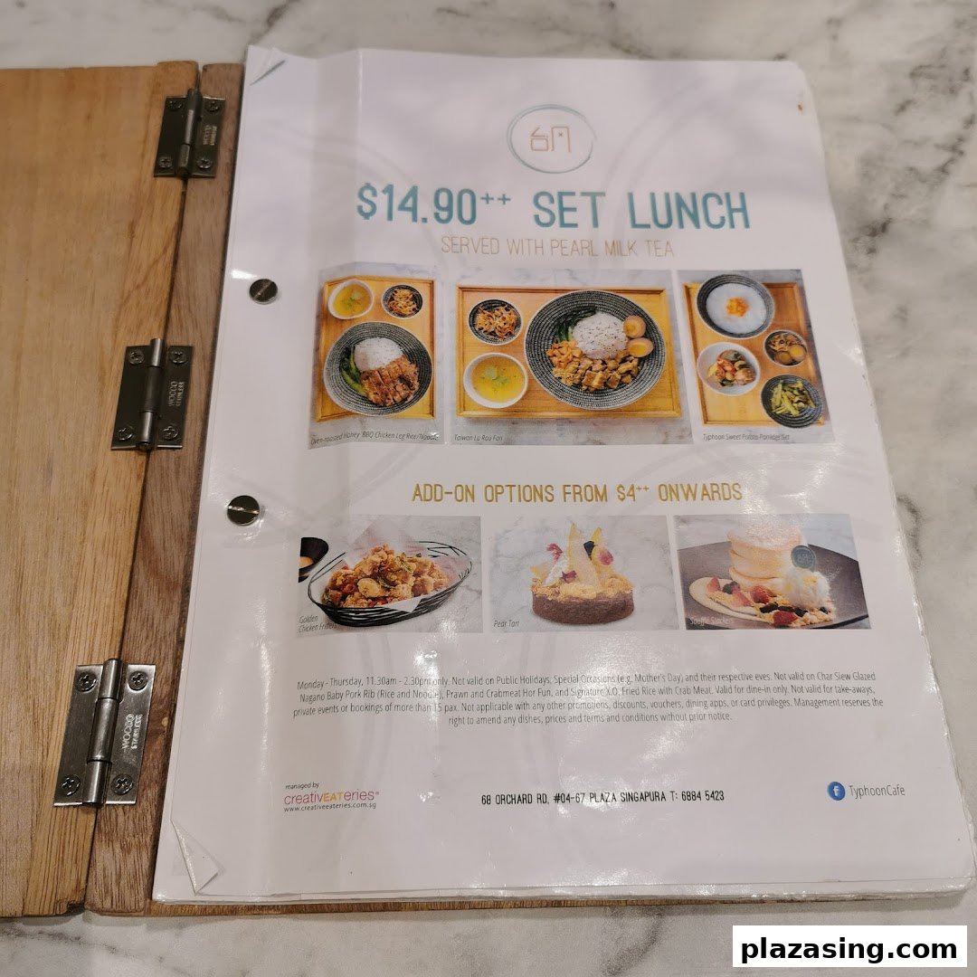 A detailed view of Typhoon Cafe's set lunch menu featuring various dishes and add-on options.