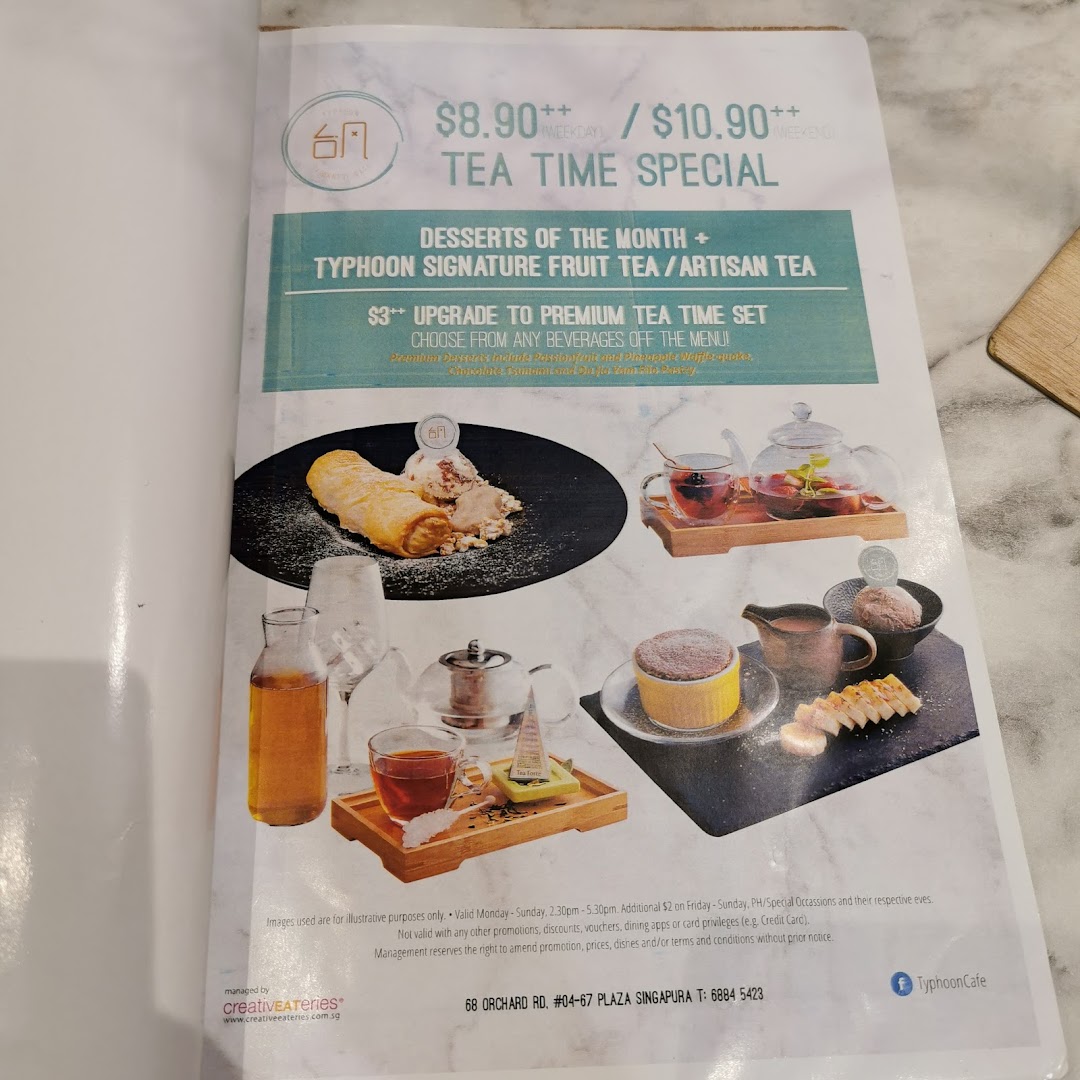 A menu page showcasing Typhoon Cafe's Tea Time Special with dessert and tea options.
