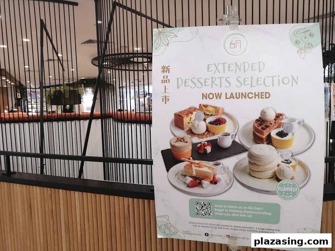 A promotional poster for Typhoon Cafe showcasing their new extended dessert selection with various sweet treats.
