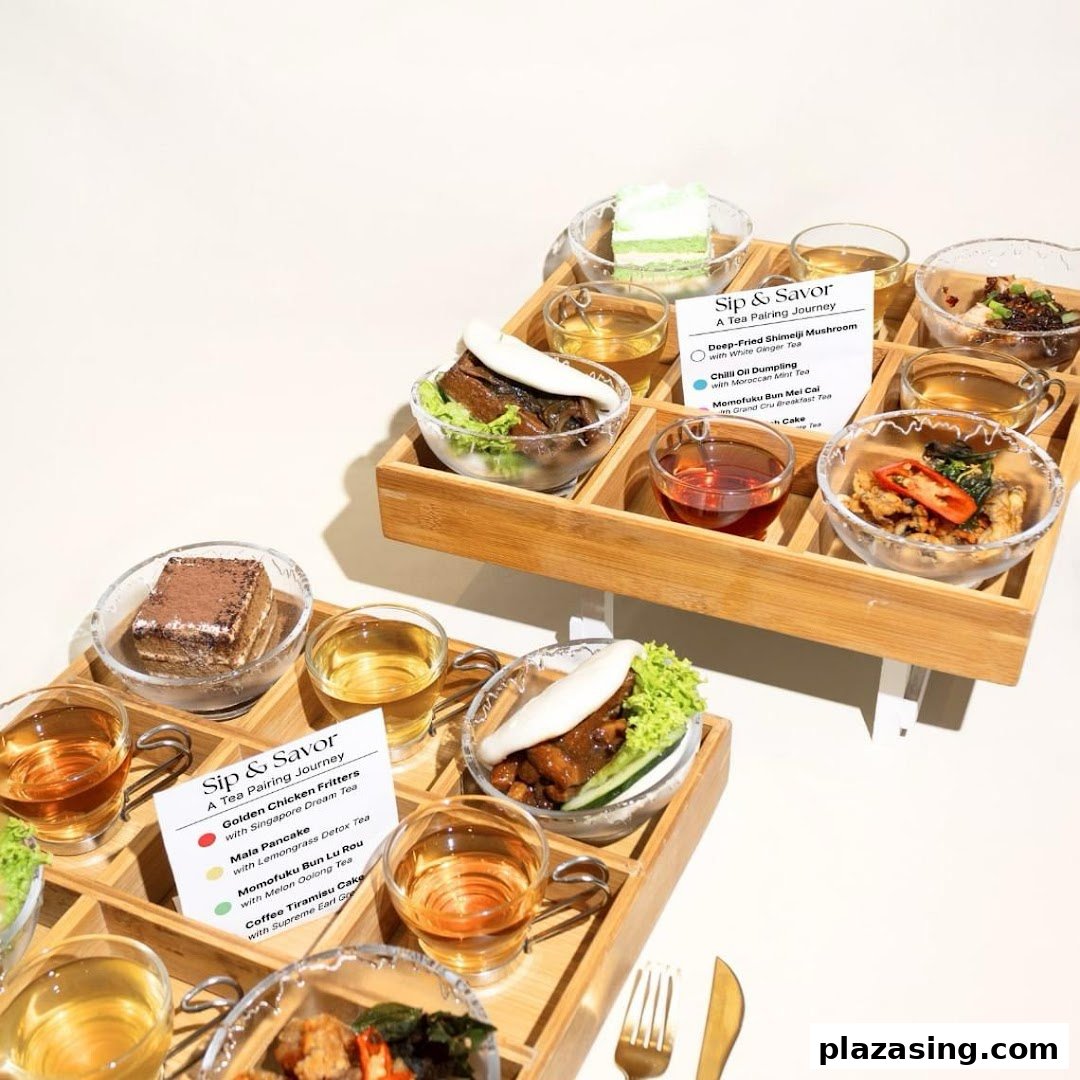Two wooden trays showcase a 'Sip & Savor' tea pairing journey with various small dishes and teas.
