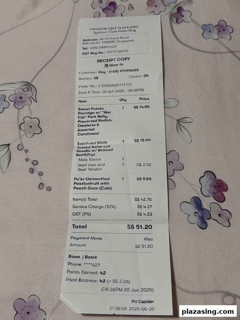 A detailed receipt from Typhoon Cafe Plaza Singapura showcasing purchased food and drink items with prices.