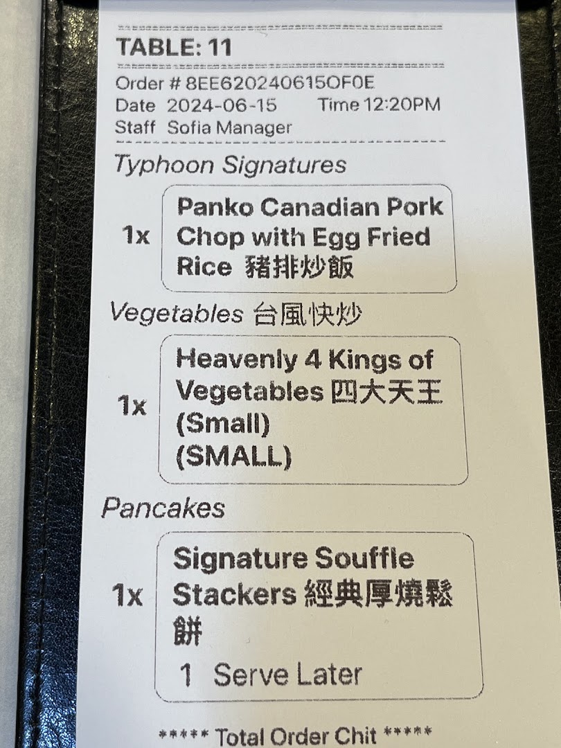 An order chit from Typhoon Cafe showing ordered items like Panko Canadian Pork Chop, Heavenly 4 Kings of Vegetables, and Signature Souffle Stackers.