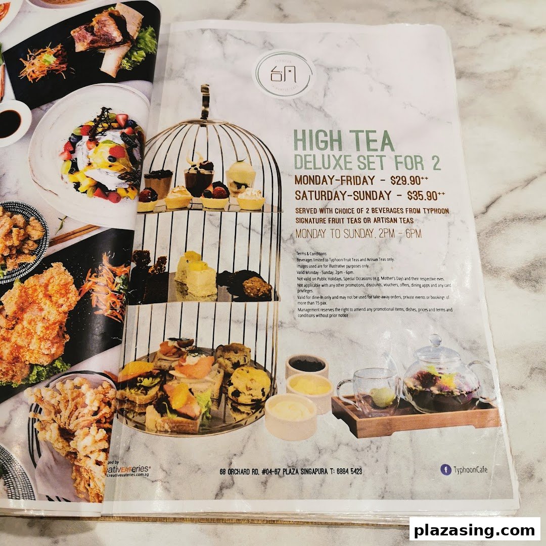 A menu page showcasing Typhoon Cafe's High Tea Deluxe Set for 2 with prices and terms.