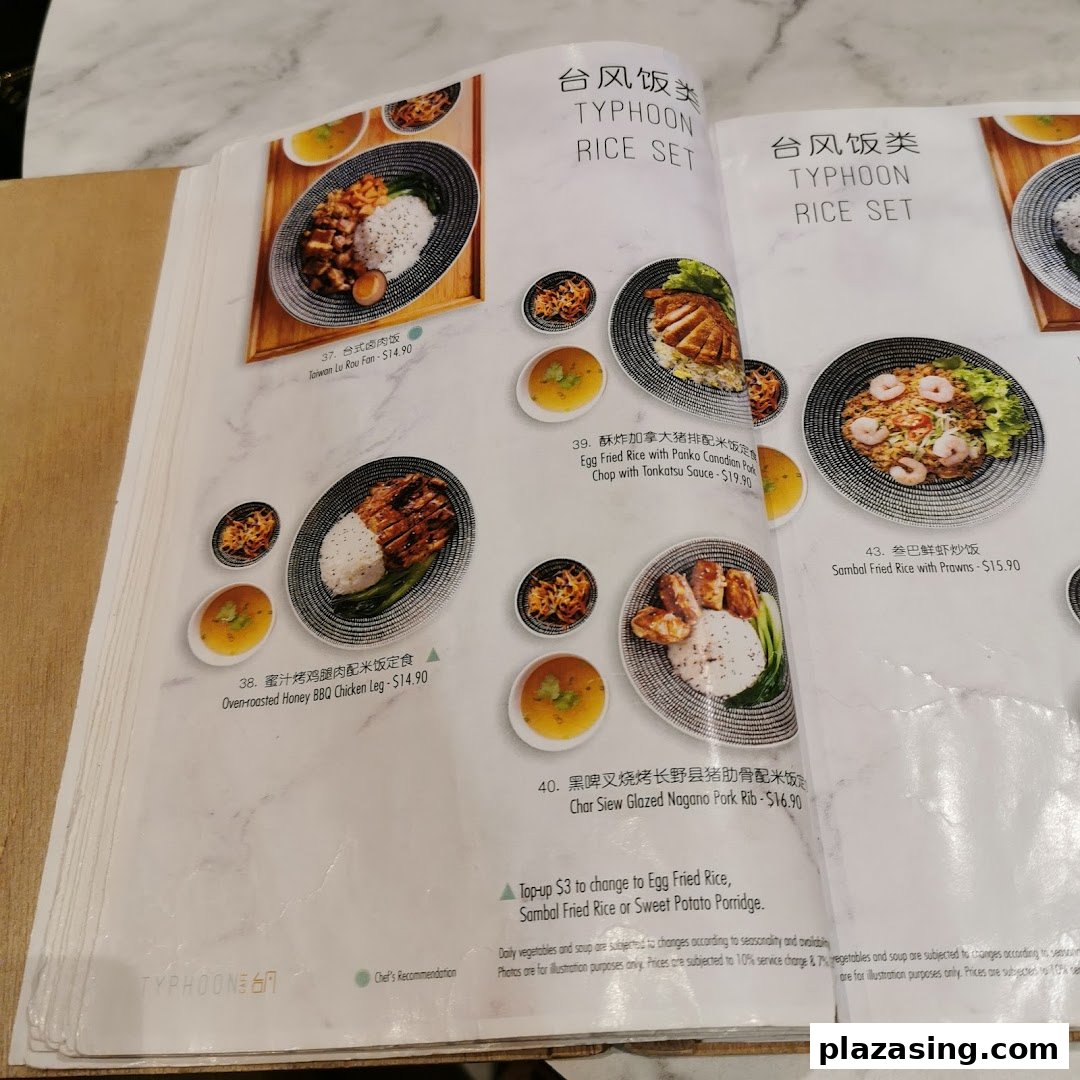 A detailed view of Typhoon Cafe's menu page featuring various rice sets with accompanying dishes.