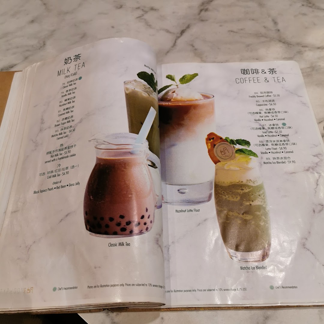 A two-page menu displaying various milk teas, coffees, and specialty beverages with prices and descriptions.