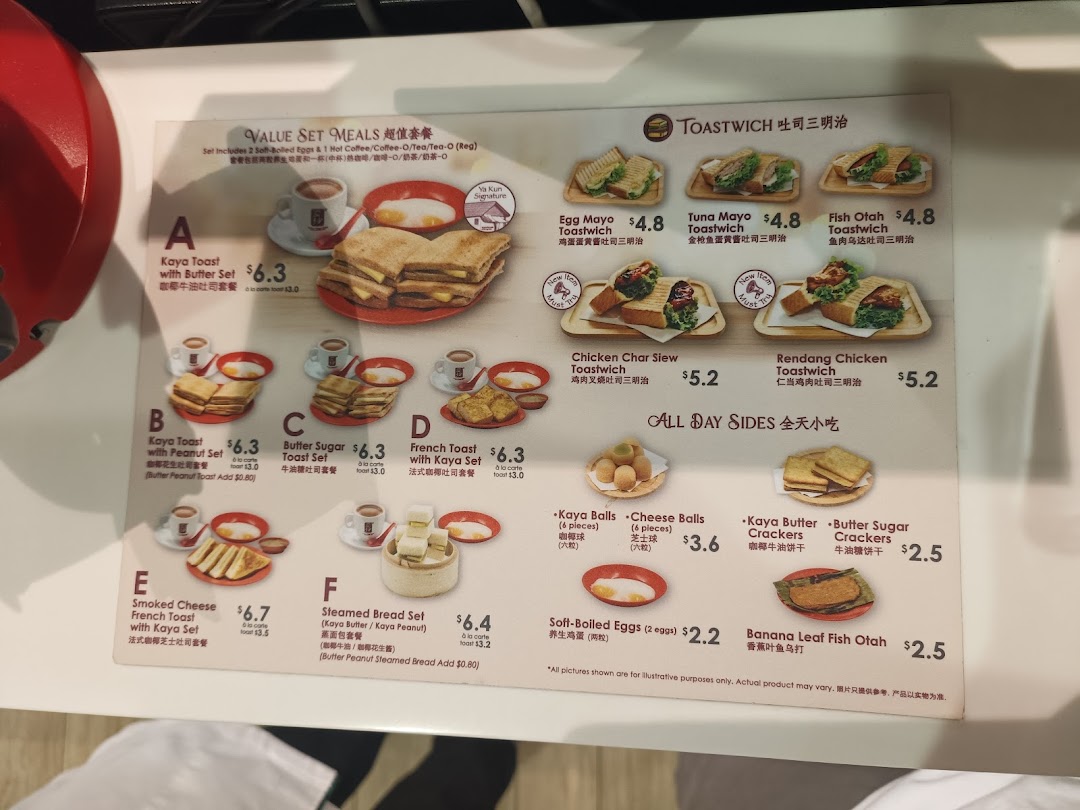 A detailed menu board from Ya Kun Kaya Toast featuring toast sets, toastwiches, and all-day sides.
