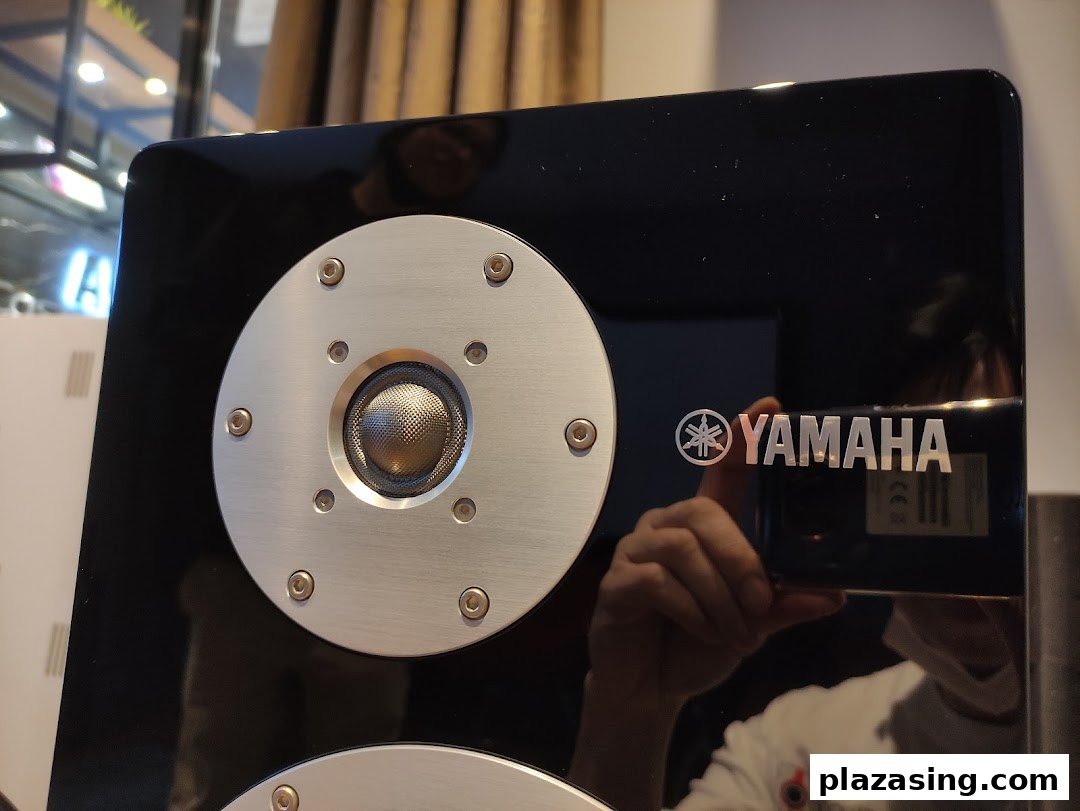 Close-up of a high-fidelity Yamaha speaker with a prominent tweeter and logo.