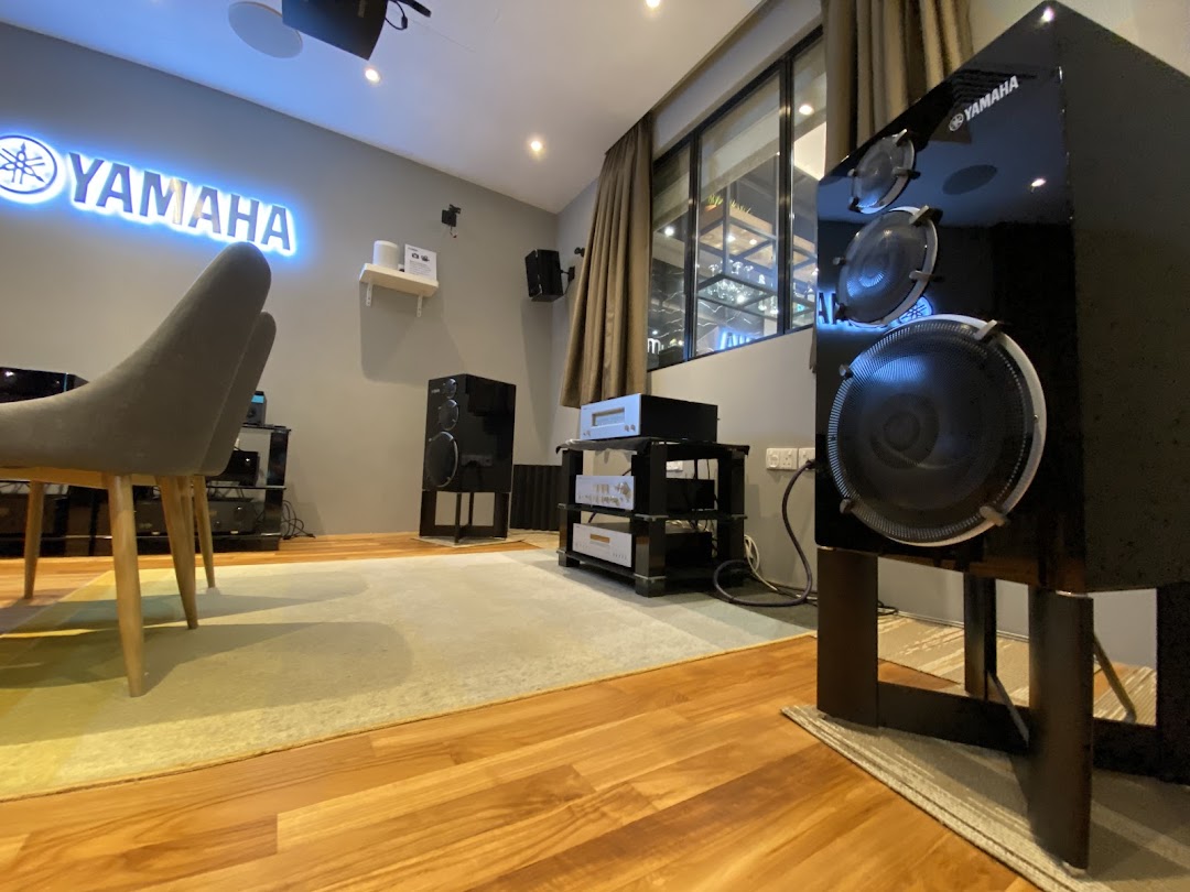 An interior view of the Yamaha AV Experience Studio showcasing high-fidelity audio equipment and speakers.