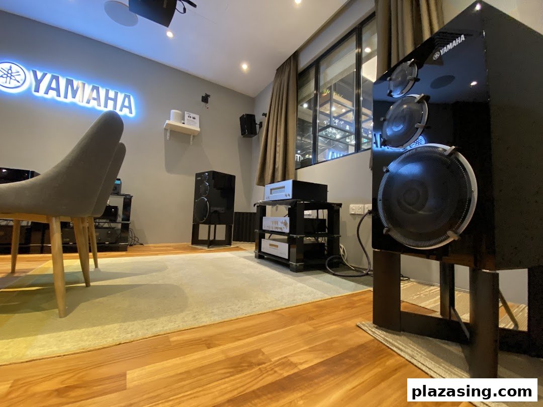An interior view of the Yamaha AV Experience Studio showcasing high-fidelity audio equipment and speakers.
