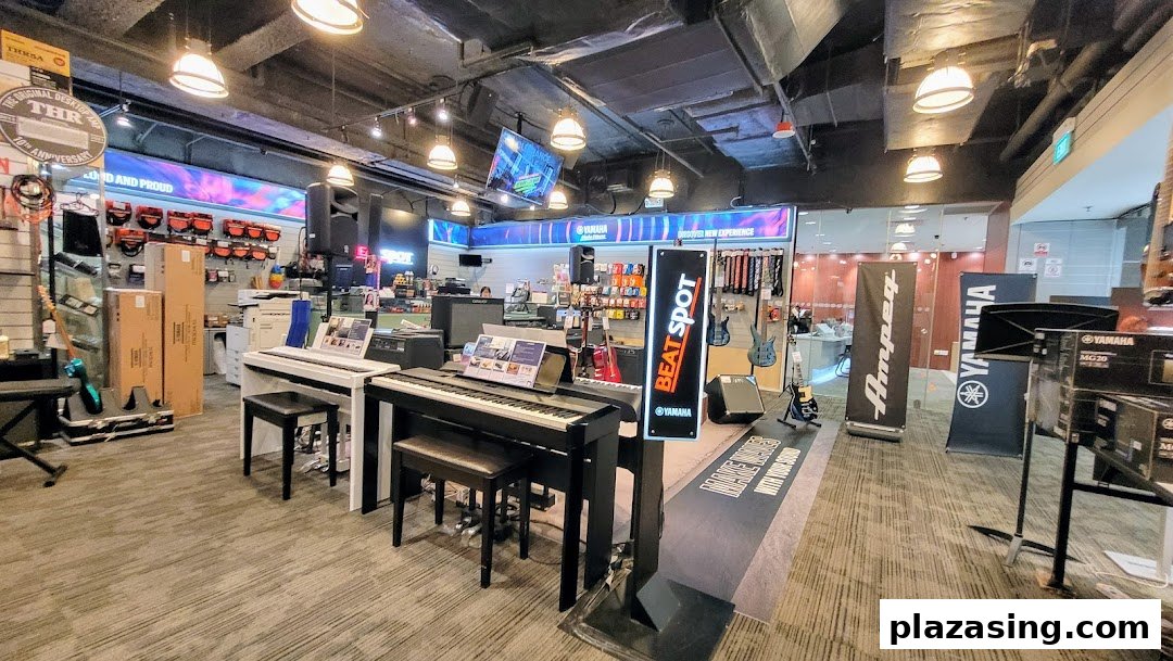 An interior view of the Yamaha Music Store, showcasing various musical instruments and audio equipment.