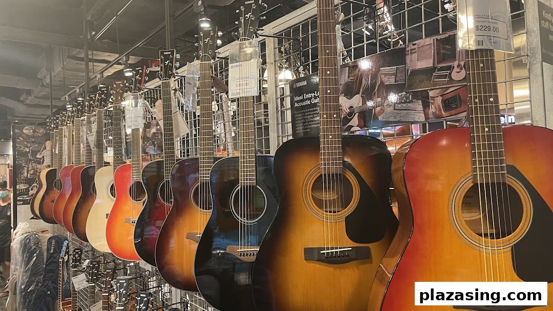 A vibrant display of acoustic guitars in various colors lines the wall of a music store.